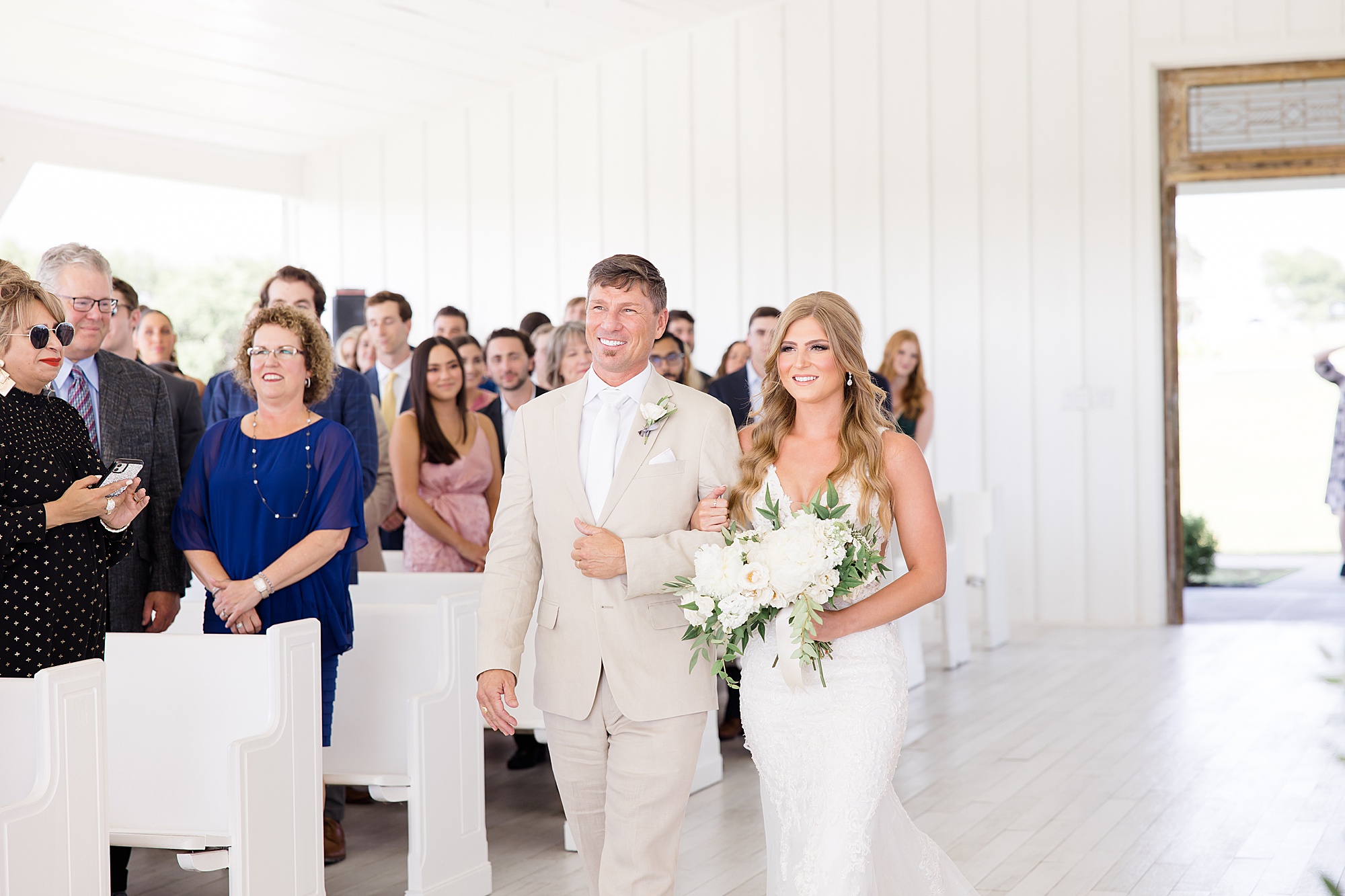 bride walks down aisle for Texas wedding ceremony