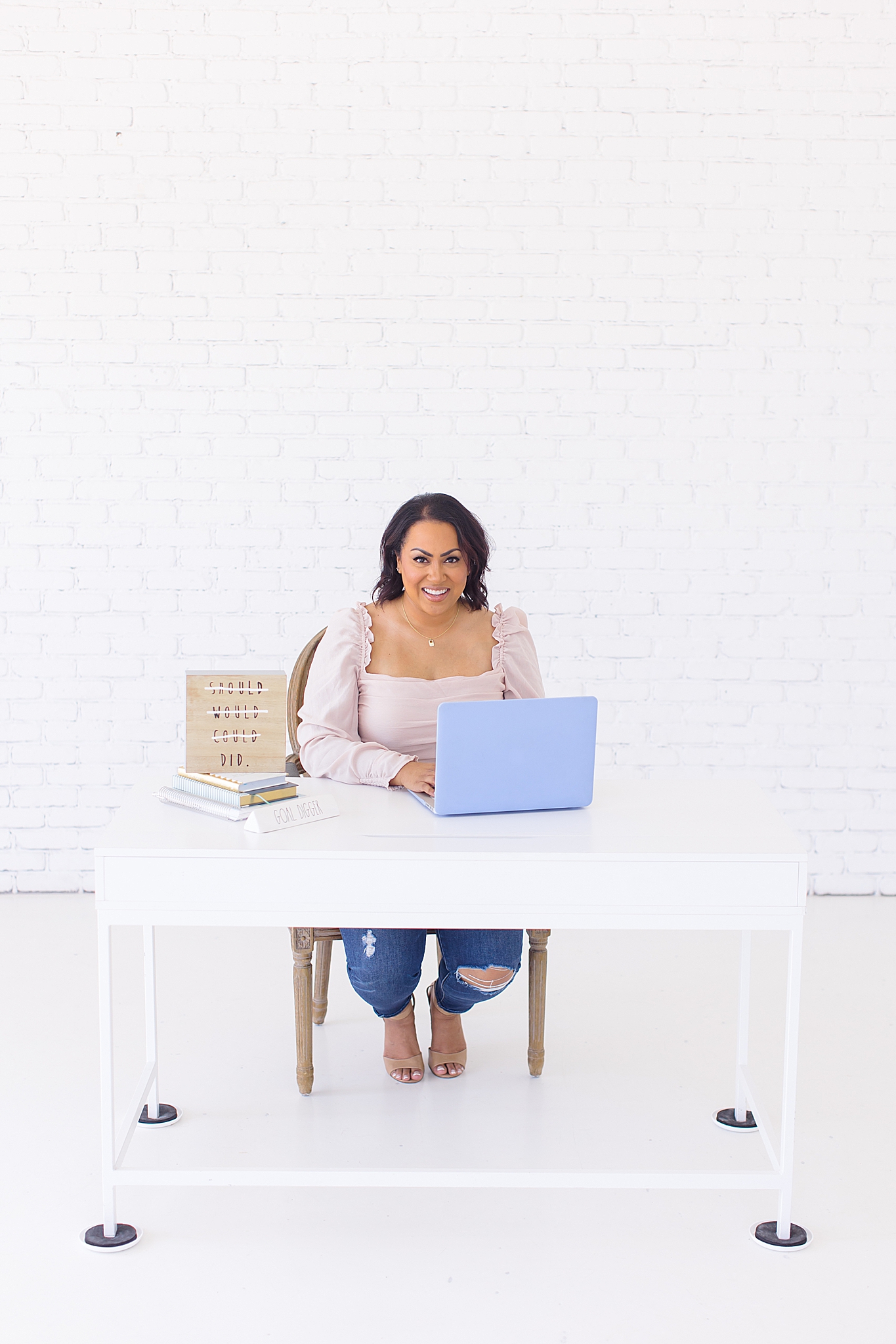 woman works on laptop during TX branding photos
