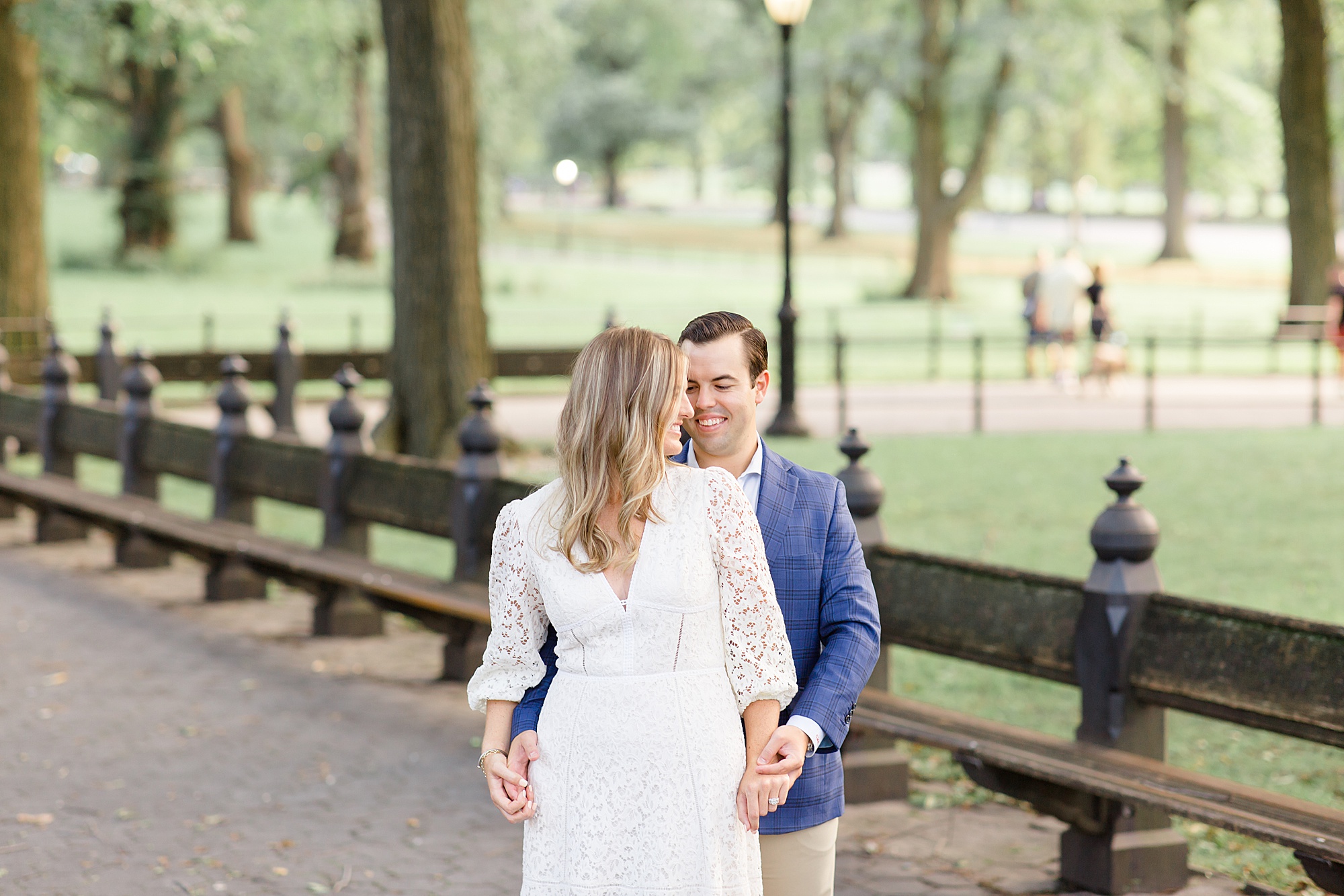 bride and groom pose in Central Park
