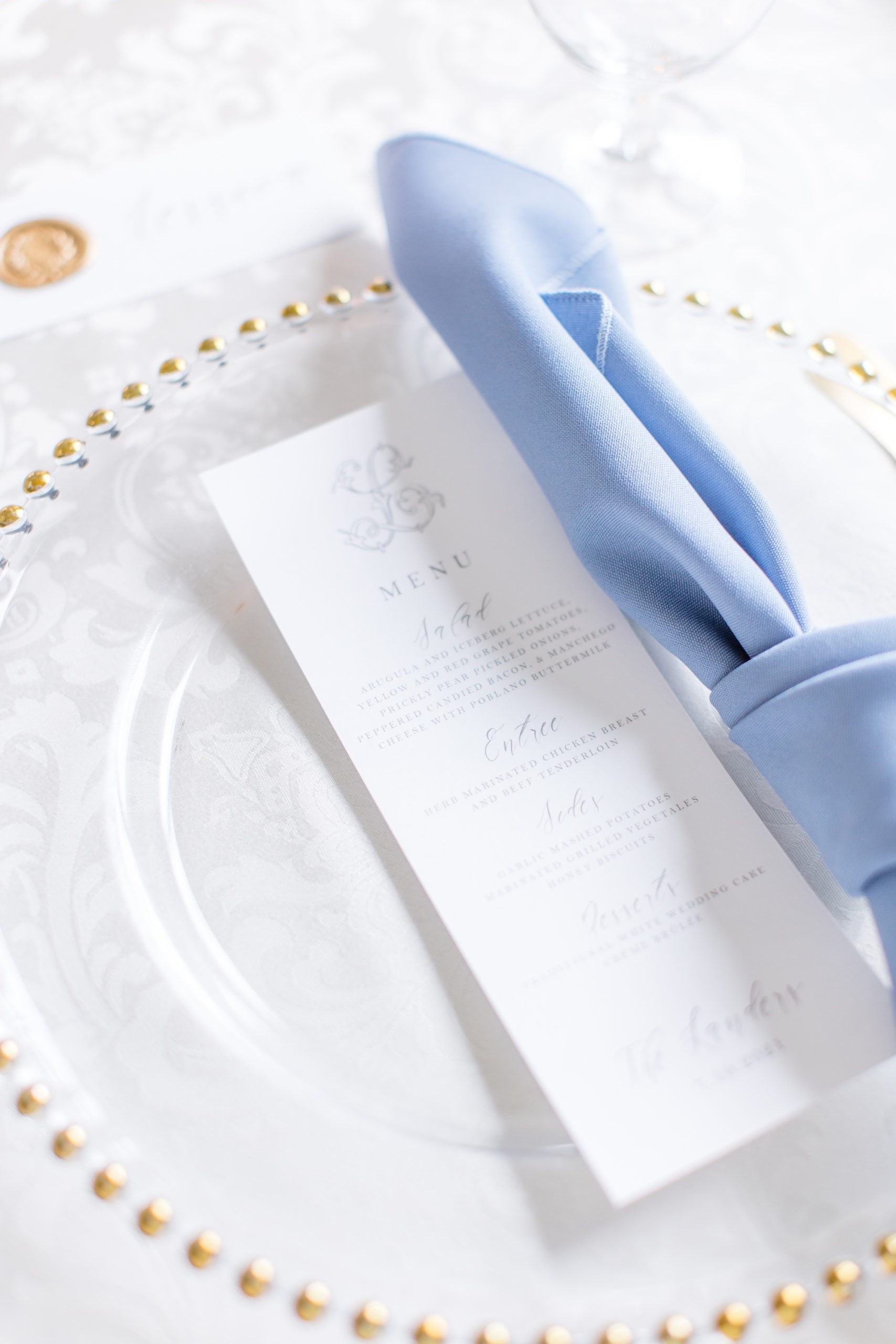 place setting with blue napkin
