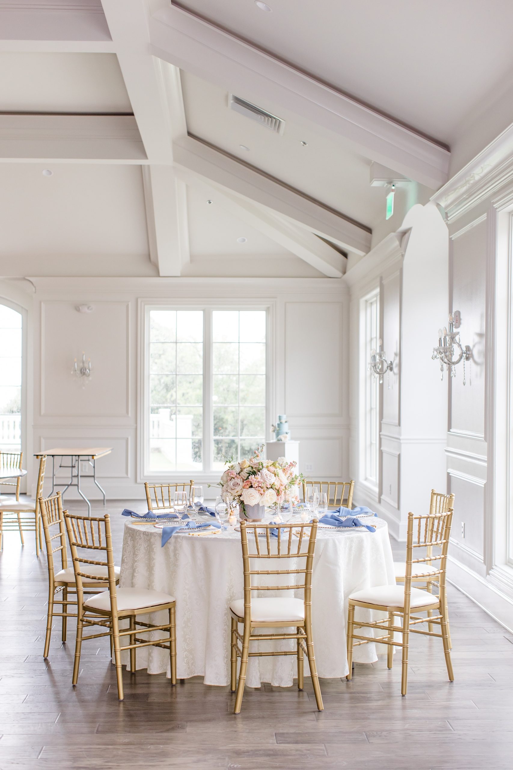 wedding reception with blue and gold details at The Hillside Estate