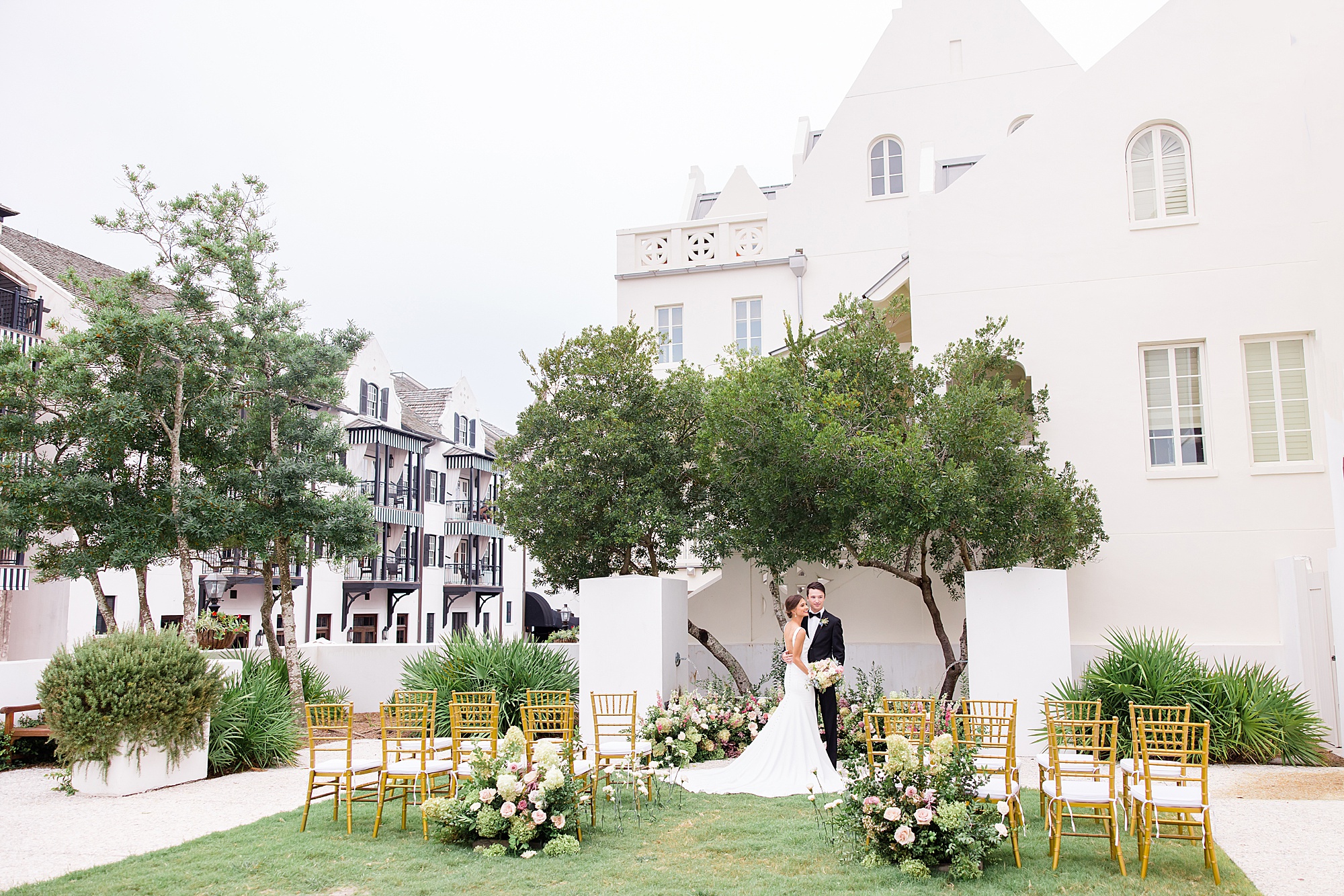bride and groom pose at alter during Rosemary Beach Town Hall