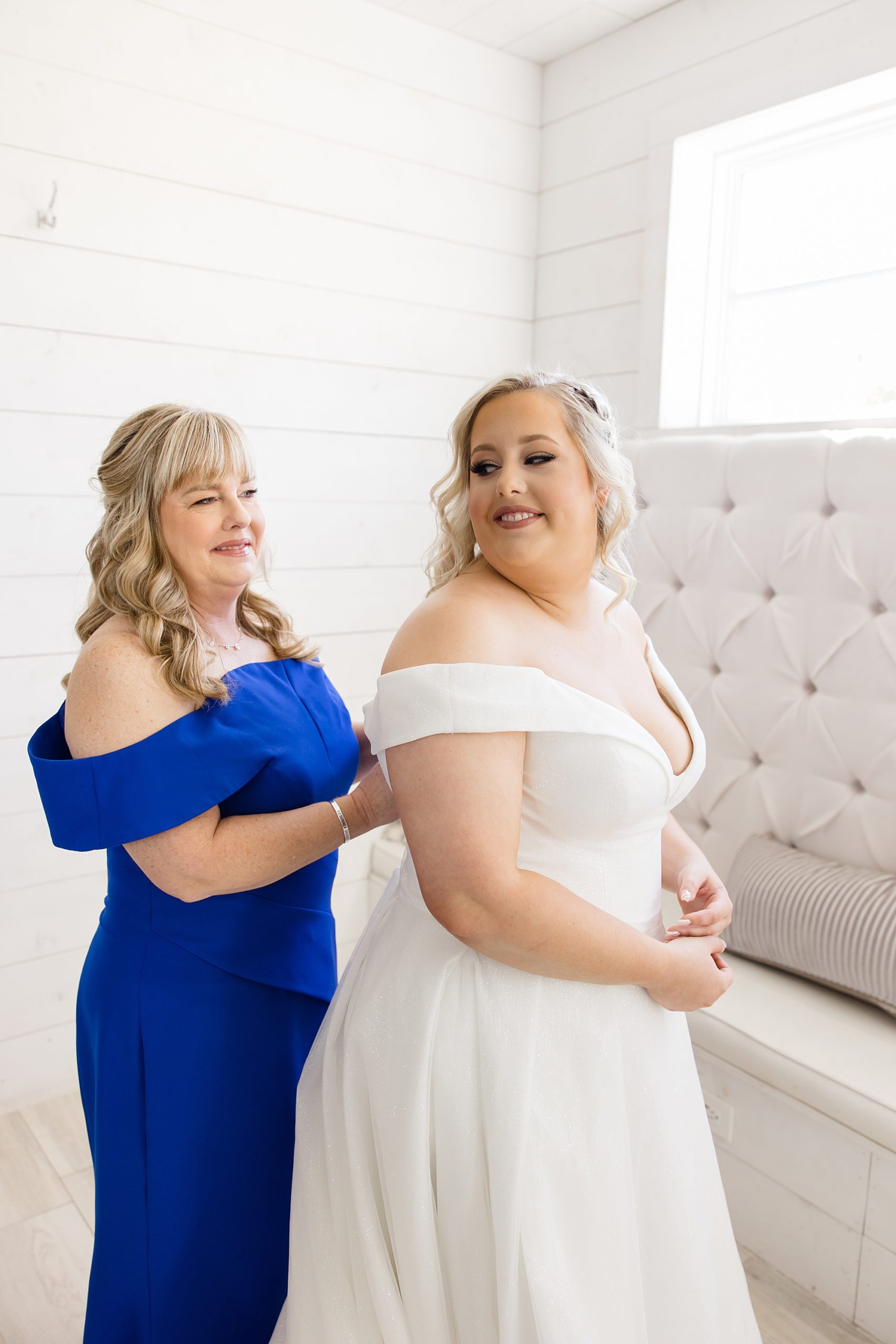 mother helps bride prepare for fall wedding at the Nest at Ruth Farms