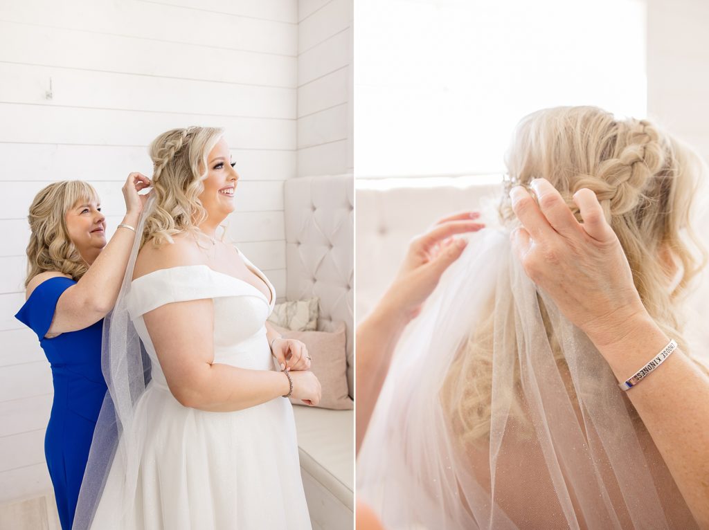 mother places veil in bride's hair before fall wedding at the Nest at Ruth Farms