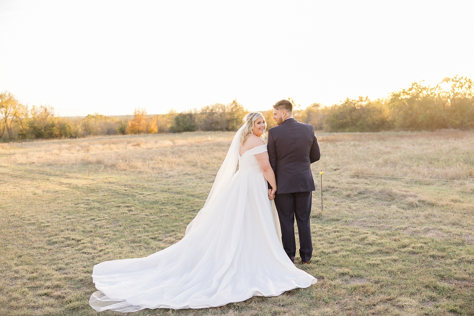 fall wedding portrait for bride and groom in Ponder TX
