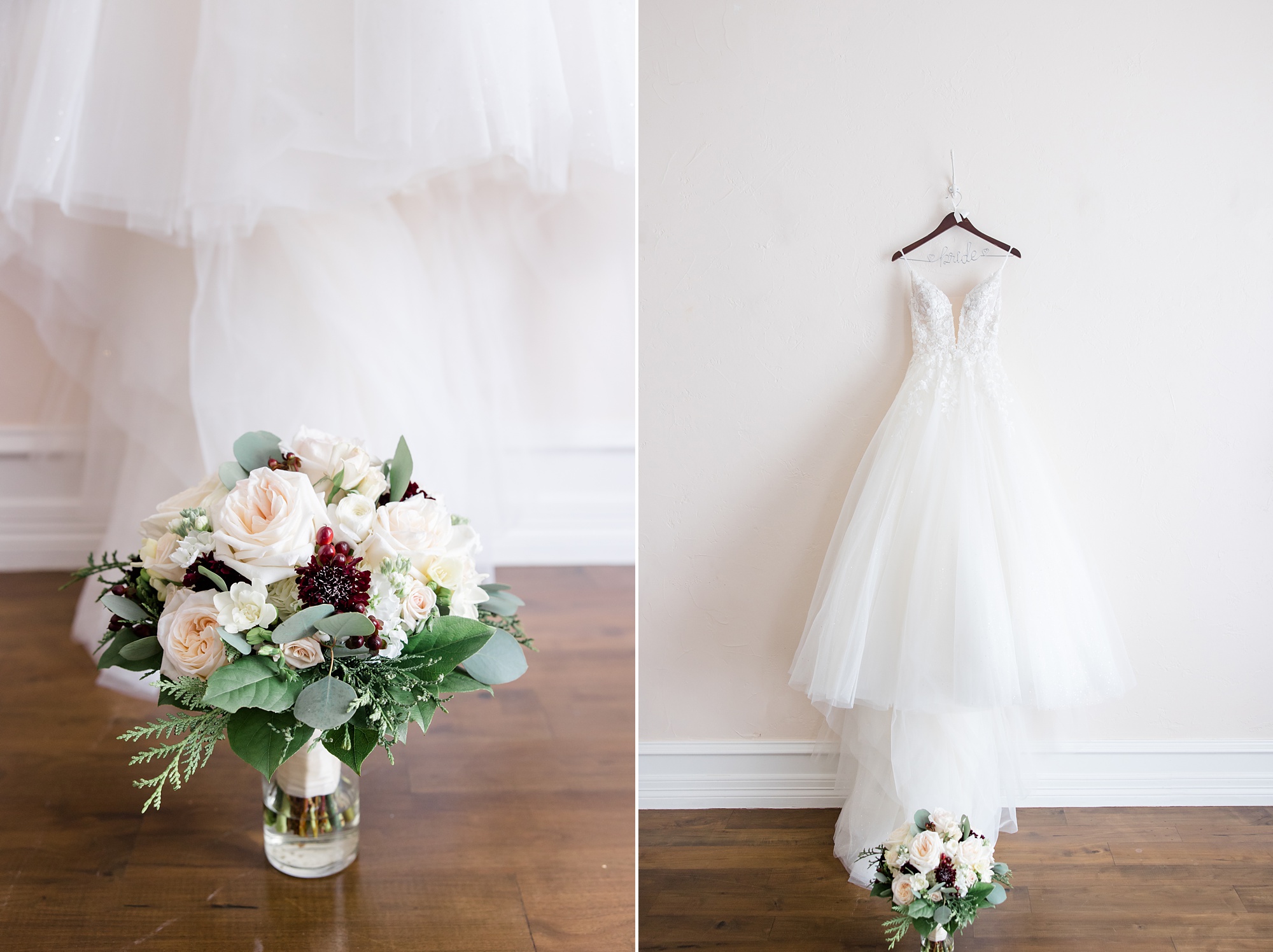 bride's gown hangs on white wall with winter wedding bouquet