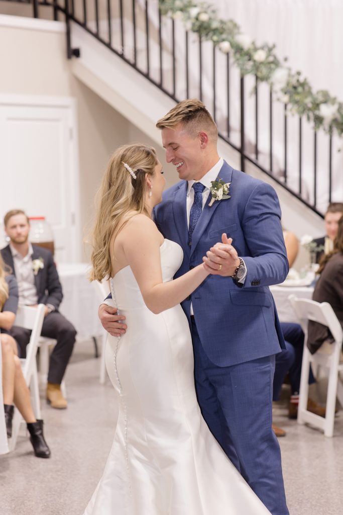 groom dances with bride during Rosewell NM wedding reception