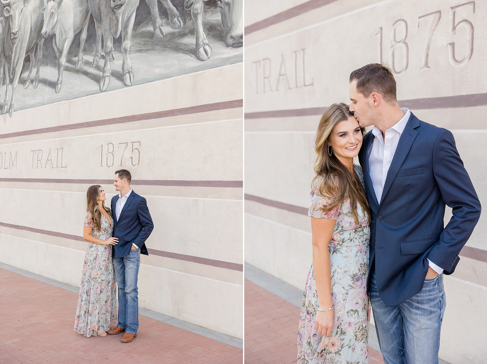 groom in navy jacket kisses bride's forehead by Chisholm Trail mural