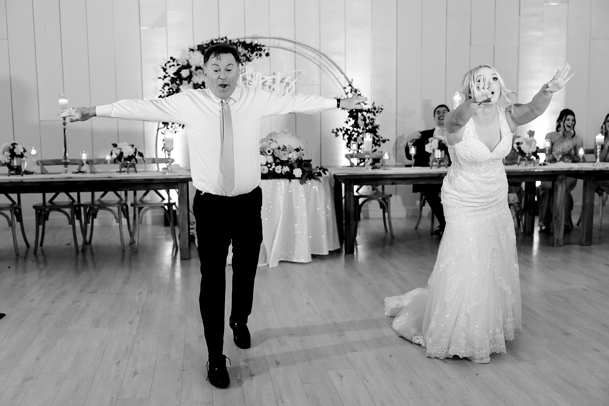 bride nd dad dance together during TX wedding reception