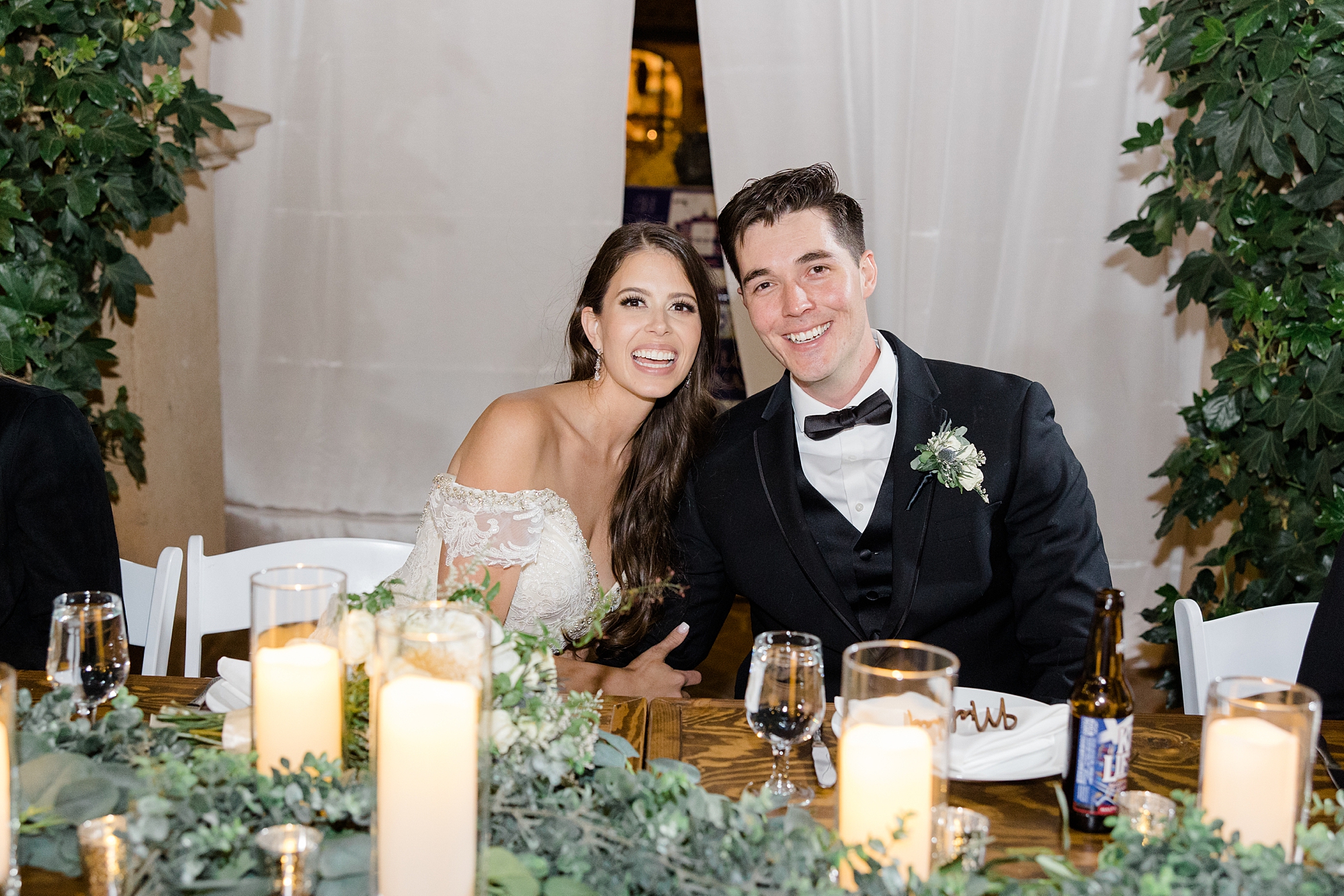 bride and groom sit during reception at Tlaquepaque