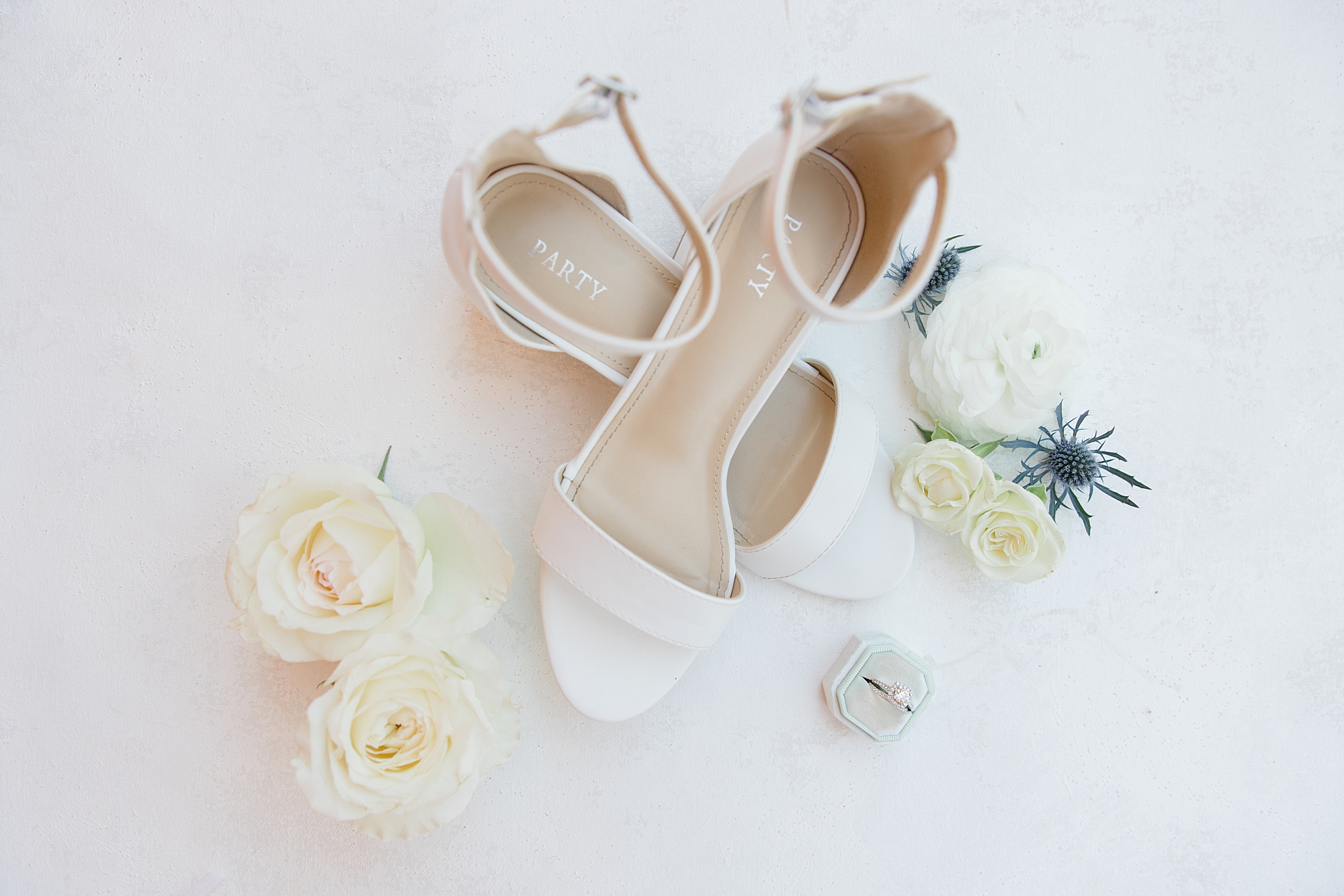 bride's white shoes for intimate Sedona wedding day