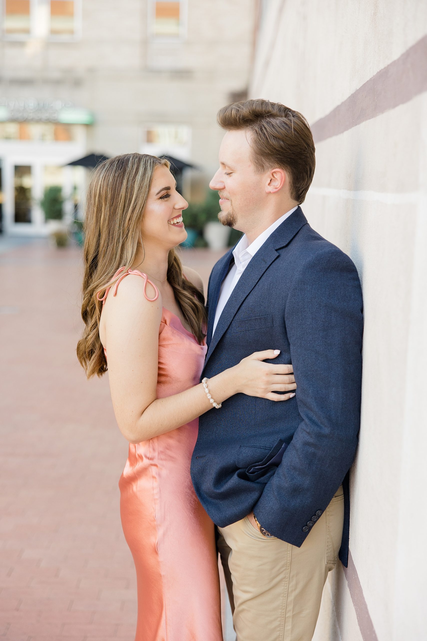 woman laughs at partner during TX engagement photos