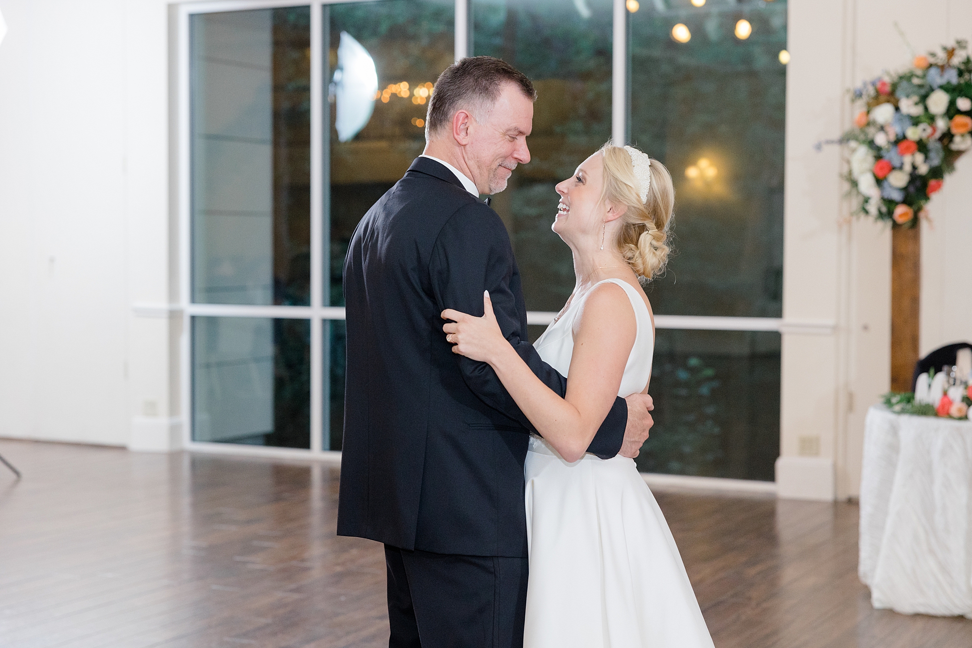 bride and dad dance together during Corinth TX wedding reception