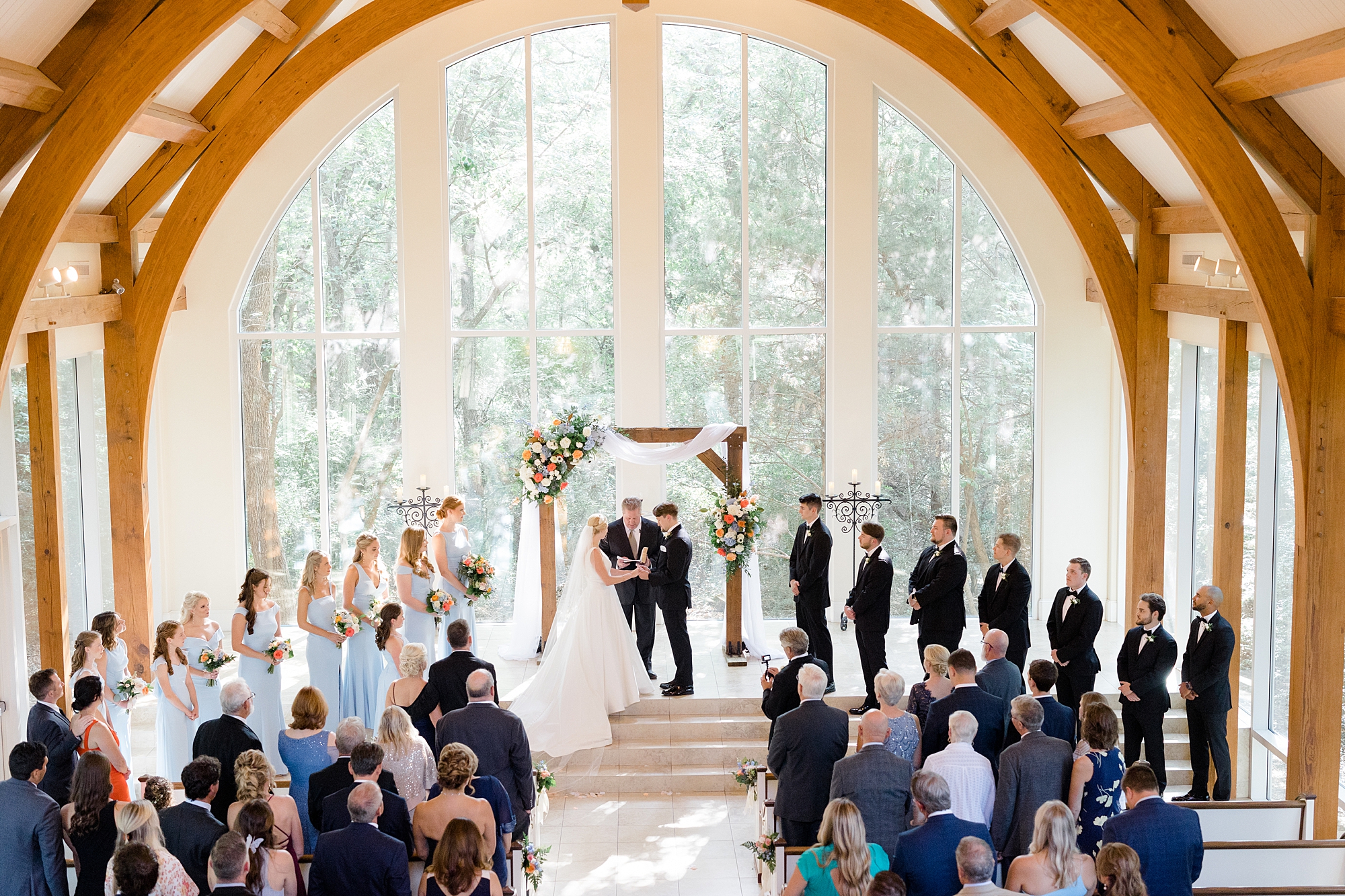 bride and groom exchange vows during chapel wedding in Texas