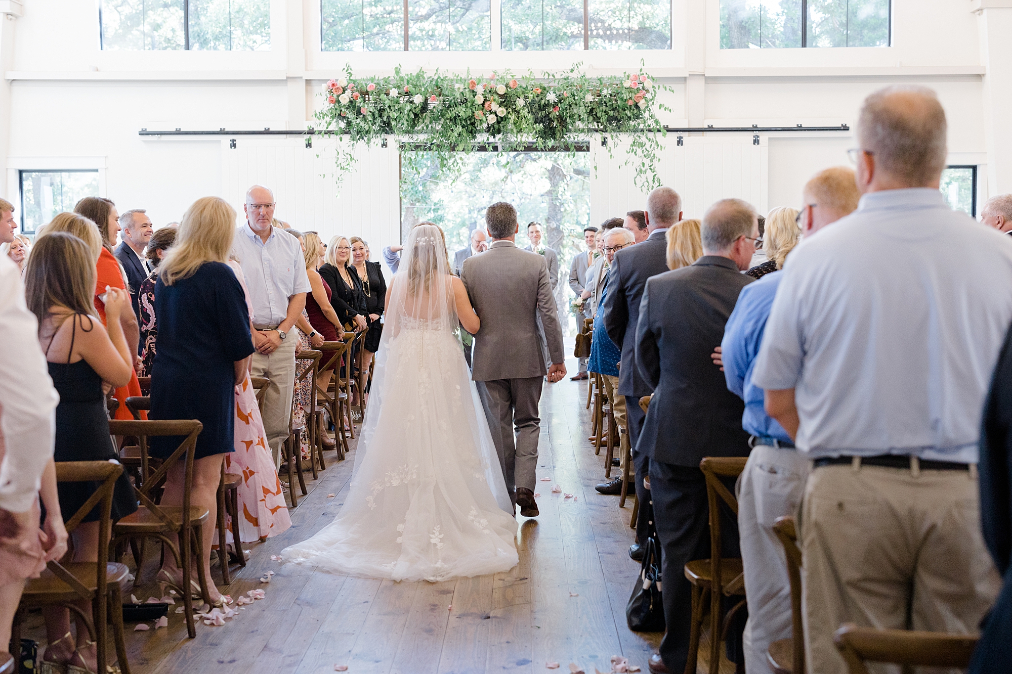dad walks bride down aisle at Oak + Ivy