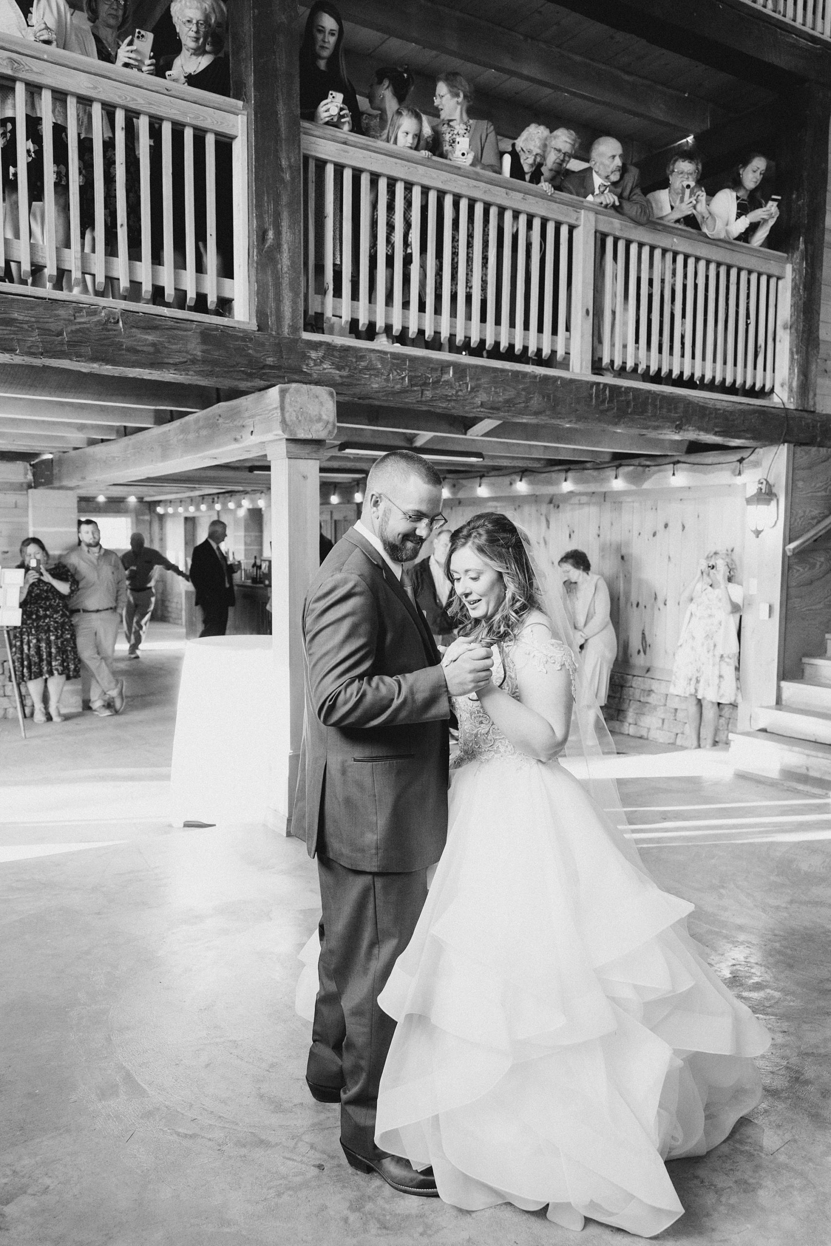 newlyweds dance during rustic New York wedding reception