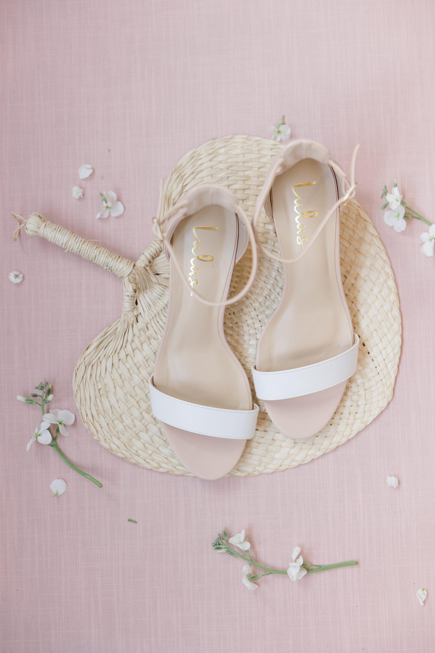 bride's shoes on fan for Boone Hall wedding