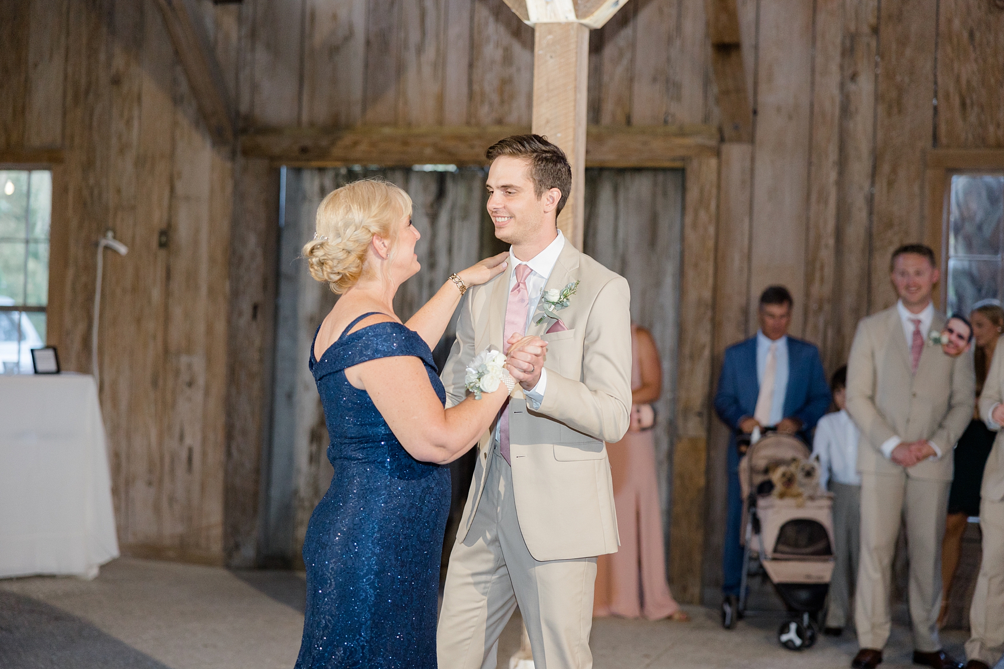 groom dances with mom during Charleston reception 