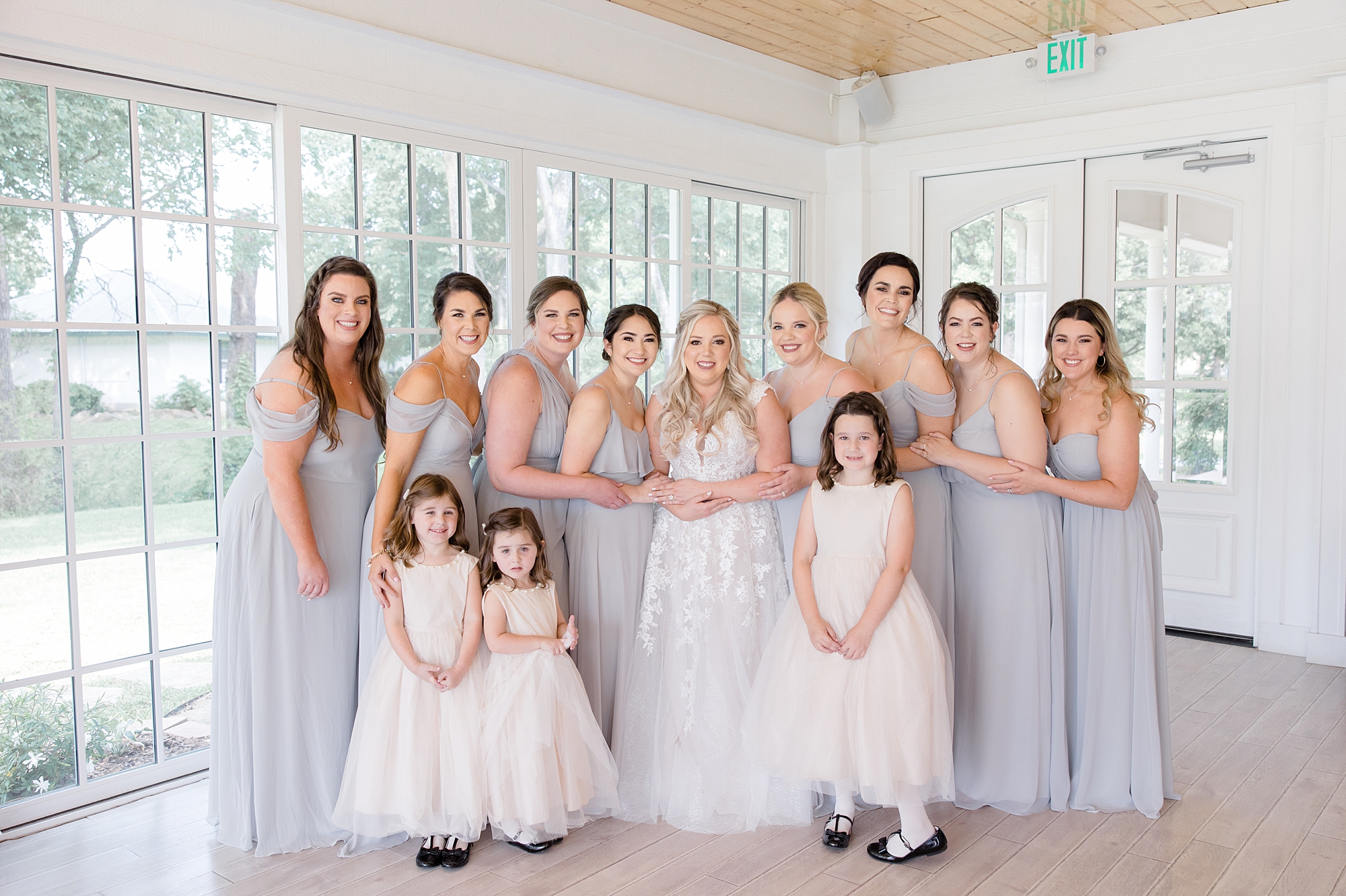 bride and bridesmaids in pastel gowns at Willow Creek