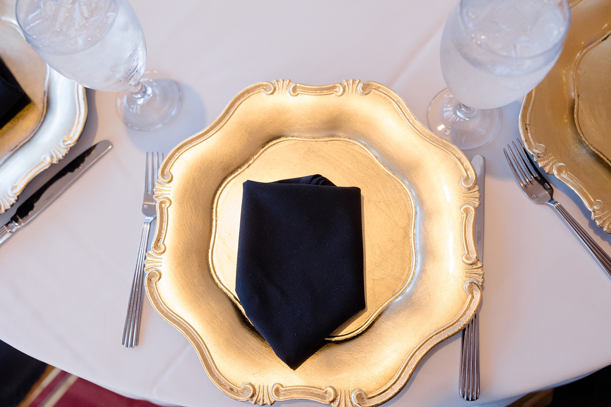 gold plate with black napkin for Fort Worth City Club wedding reception 