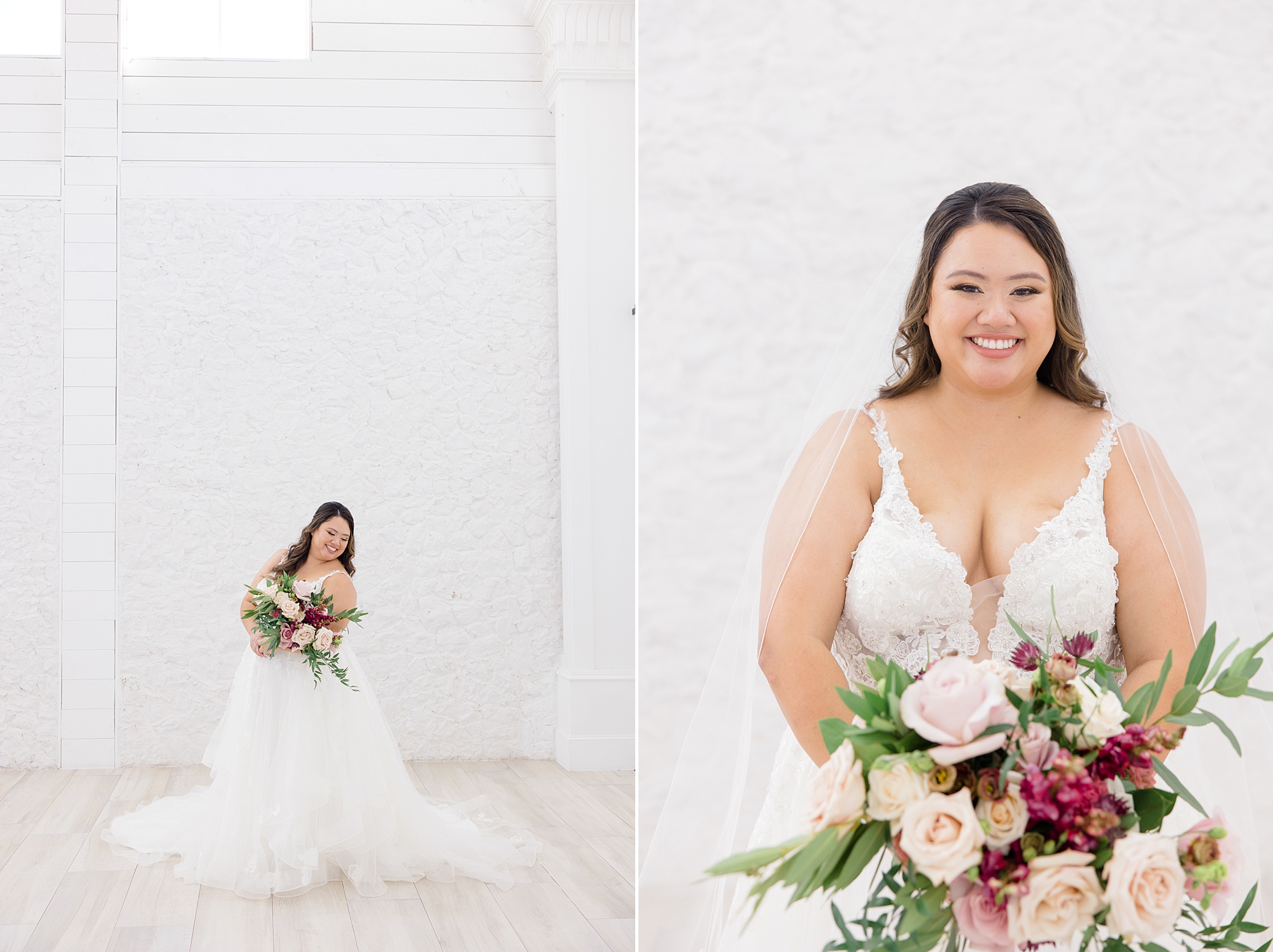 bride holds bouquet of pink flowers standing in front of brick wall 