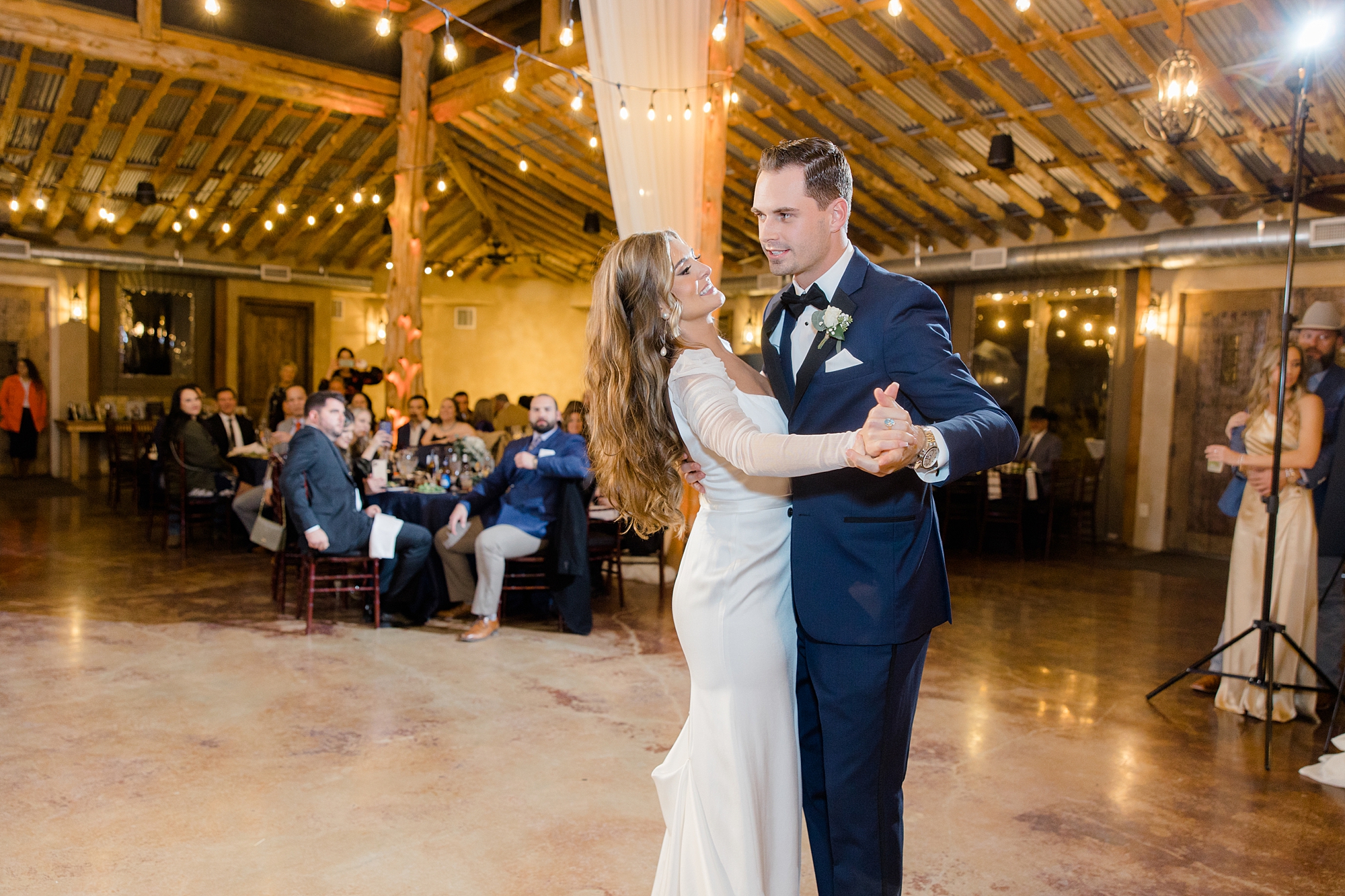 bride and groom dance during TX wedding reception 