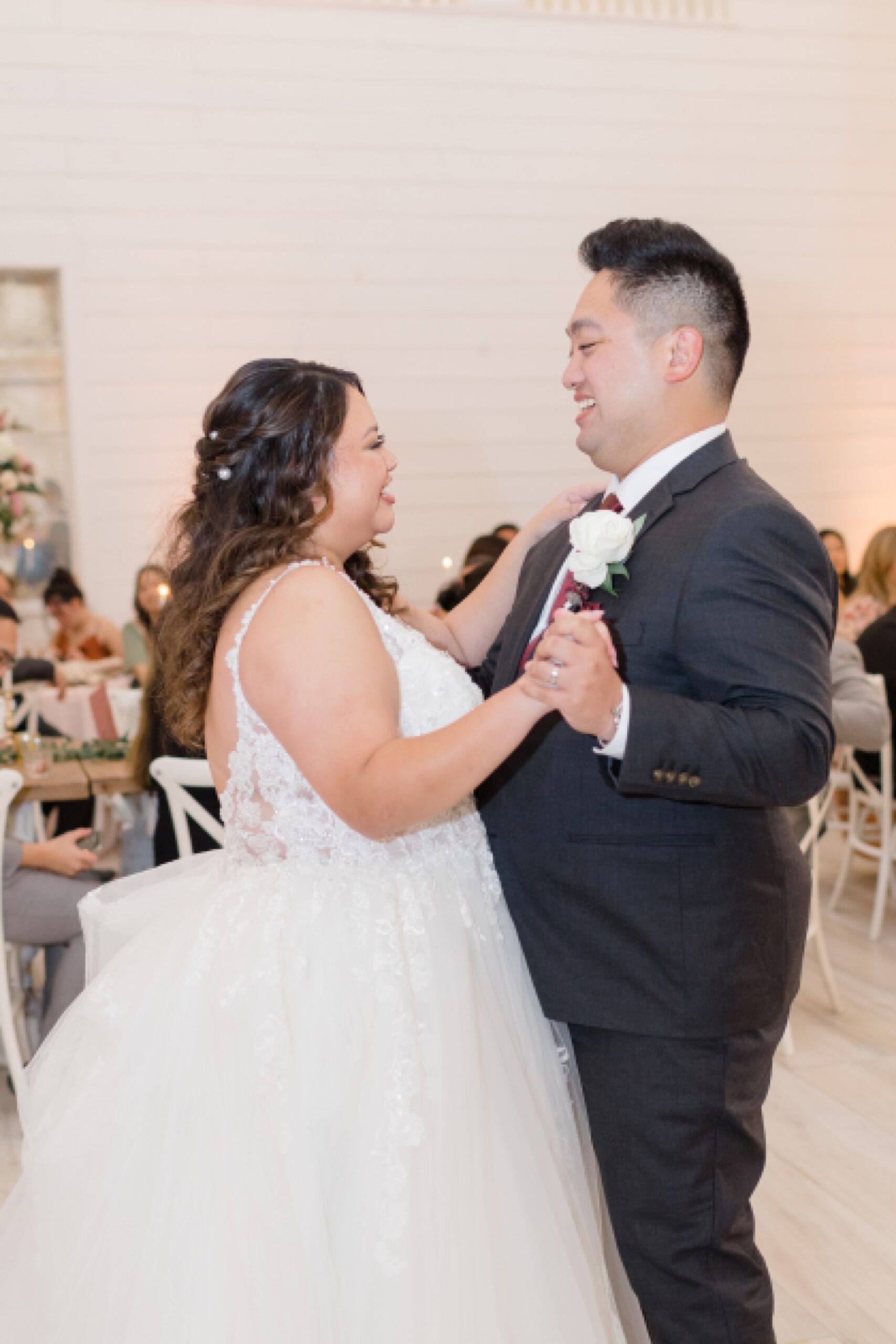 newlyweds have first dance together during winter Nest at Ruth Farms wedding reception