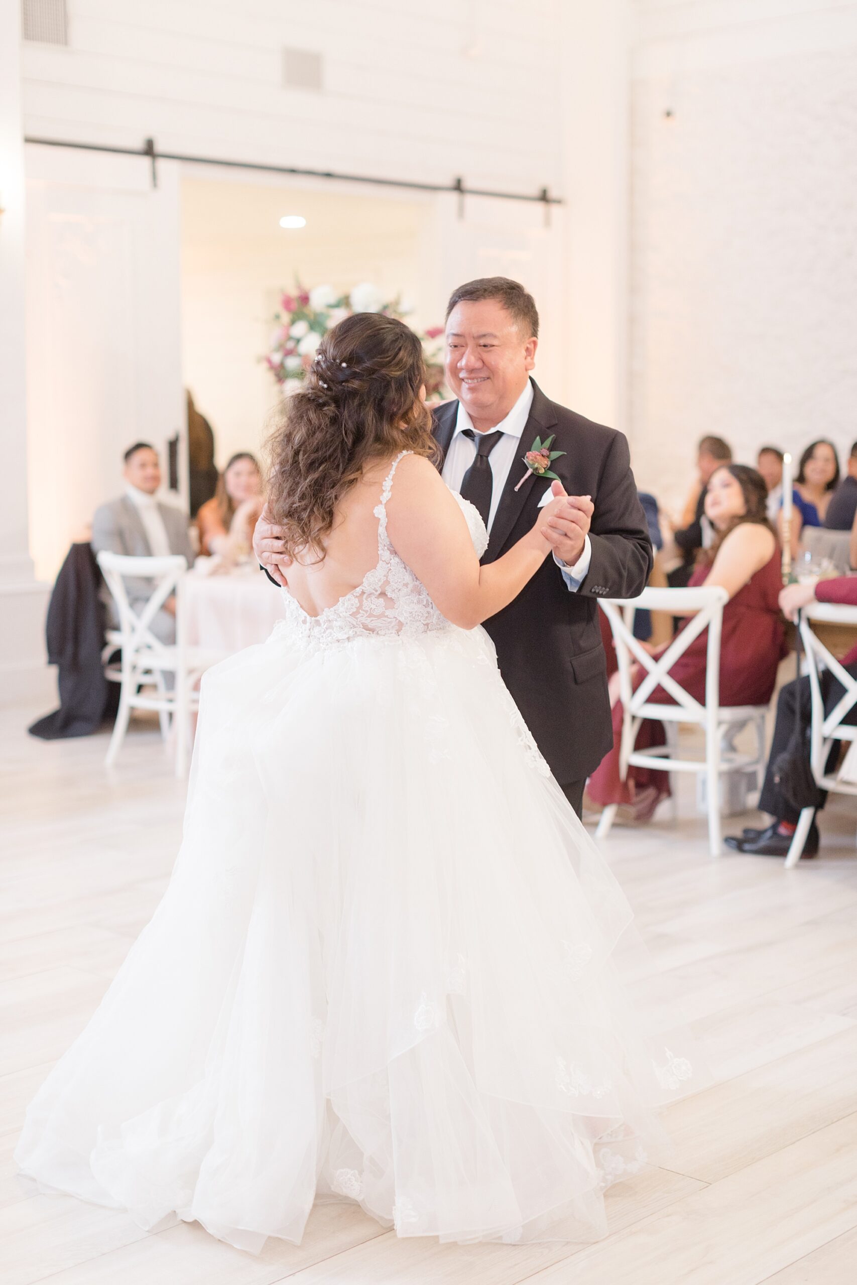 bride dances with father during Nest at Ruth Farms wedding reception